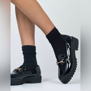 Elegant Black Loafers with Gold Accent